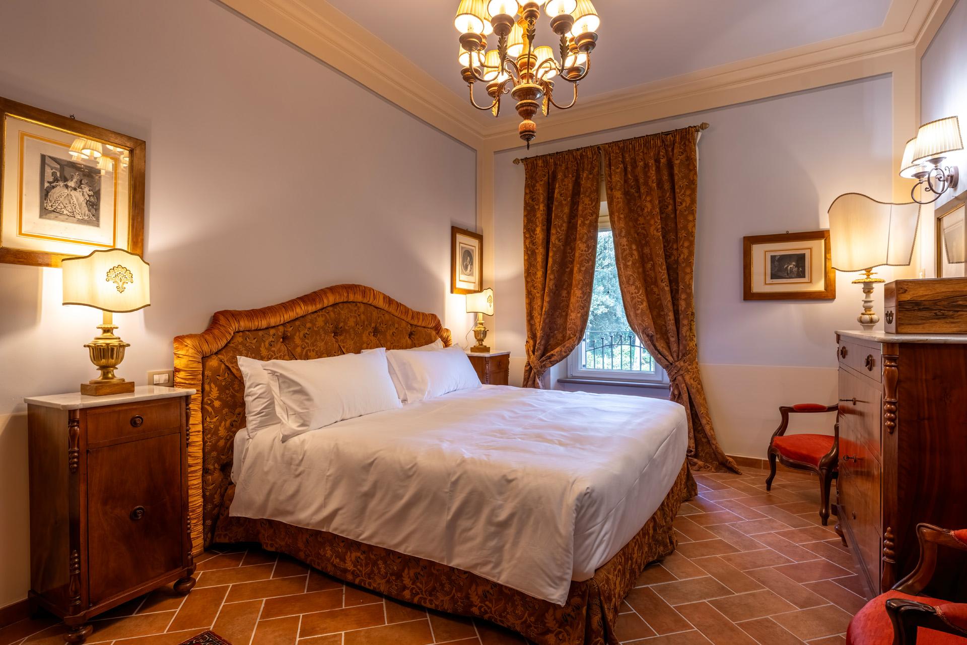La Scuderia of Villa Valentini Bonaparte, elegant Suites for a relaxing stay, nestled in the Tuscan countryside.
